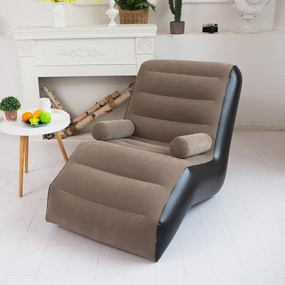 Inflatable chair in a living room setting with a fireplace and decorative items.