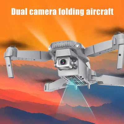 Dual camera folding aircraft with a colorful sky background